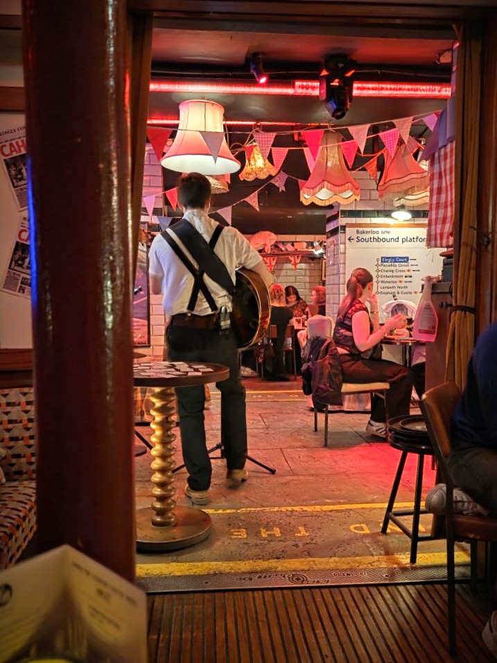 Musician at Cahoots Underground Soho, London England