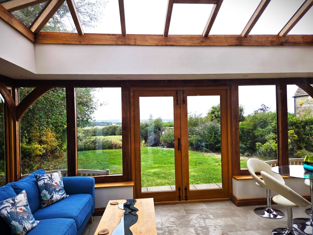 View out of rear sunroom (orangery) at Fairstow at Stow-On-The-Wold Cotswol;ds England